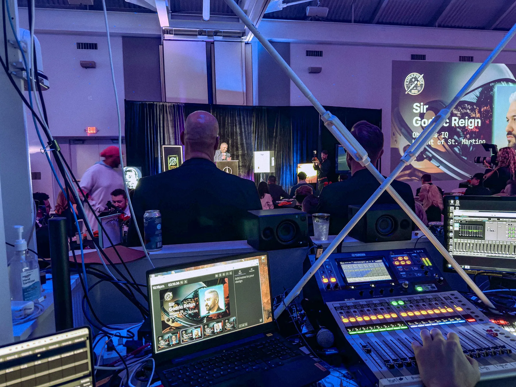 Operator at a show-control position surrounded by monitors