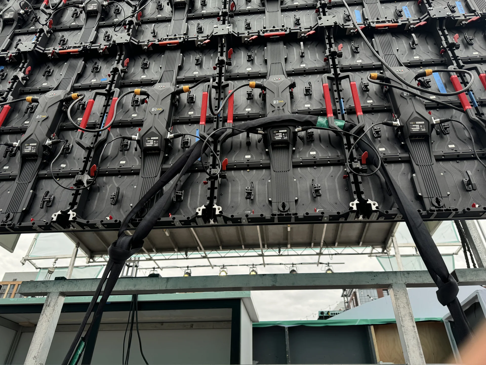 Close view of LED panel rears with locking hardware and cable runs
