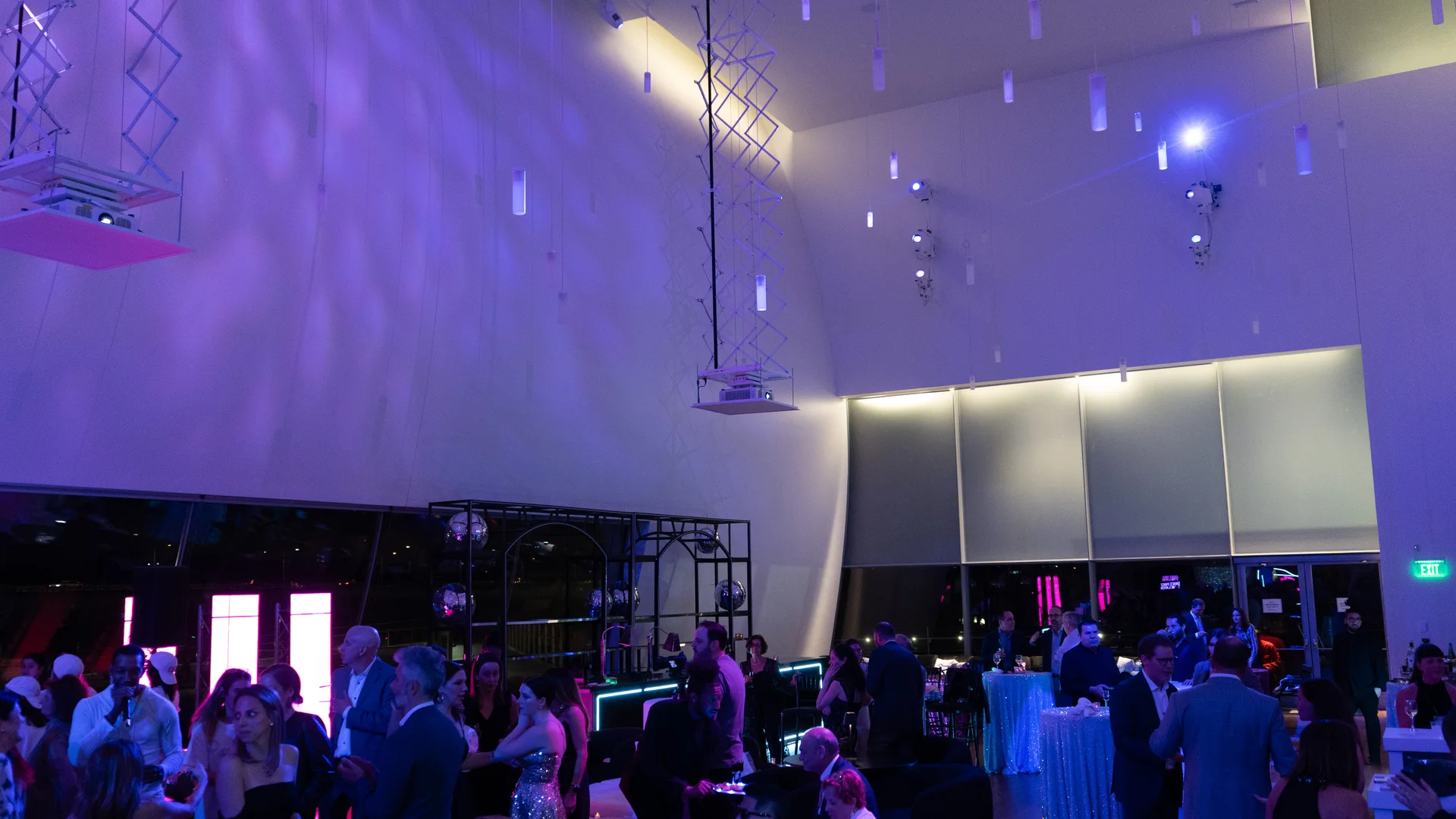 The Reach's angular white walls washed in projected texture during an event